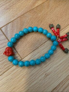 Vintage Buddha Turquoise Beaded Bracelet with Red Accent Charm